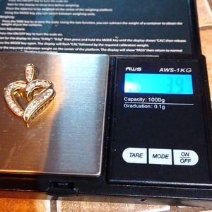 14Kt Gold 3.9 Grams Real ² Daimonds Heart Pendant